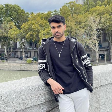 Shubh leaning on a bridge looking very husband-material